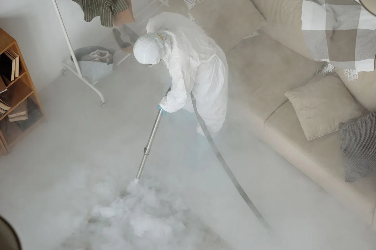 Biohazard cleanup technician in protective equipment, Crimora, VA